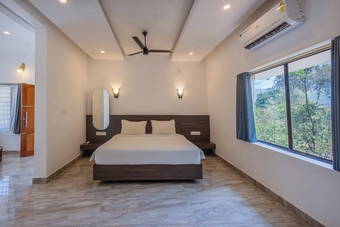 Hotel Unit Deluxe with wardrobe, TV, and tea/coffee station, Karma Vythiri