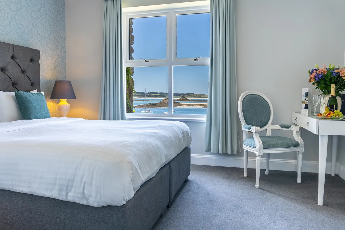 Weekend escape at Karma St. Martin's – sea-view room with champagne, flowers and boats in the bay