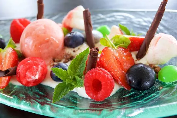 Berry dessert with sorbet, meringue and chocolate curls at Cloudesley Shovell Restaurant, Karma St. Martin's