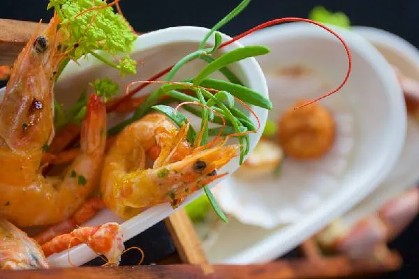 Seafood platter of garlic prawns and scallops at Cloudesley Shovell Restaurant, Karma St. Martin's
