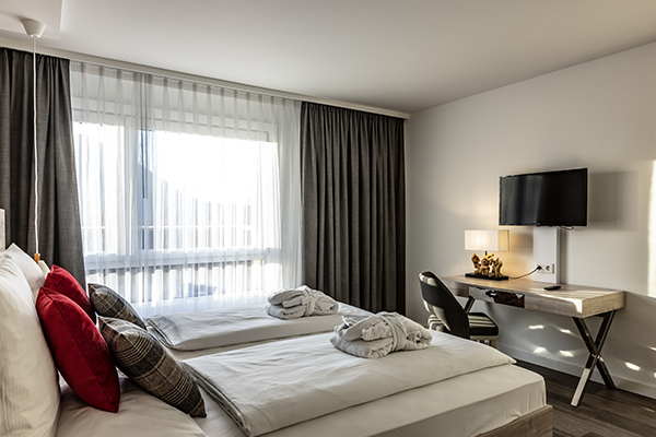 Karma Bavaria Resort Page DE Deluxe Suite mit einem Schlafzimmer